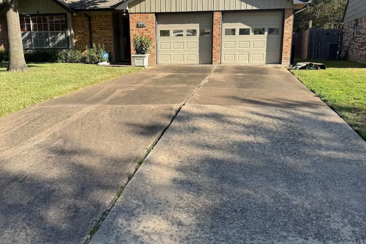 Driveway before pressure washing — Houston TX