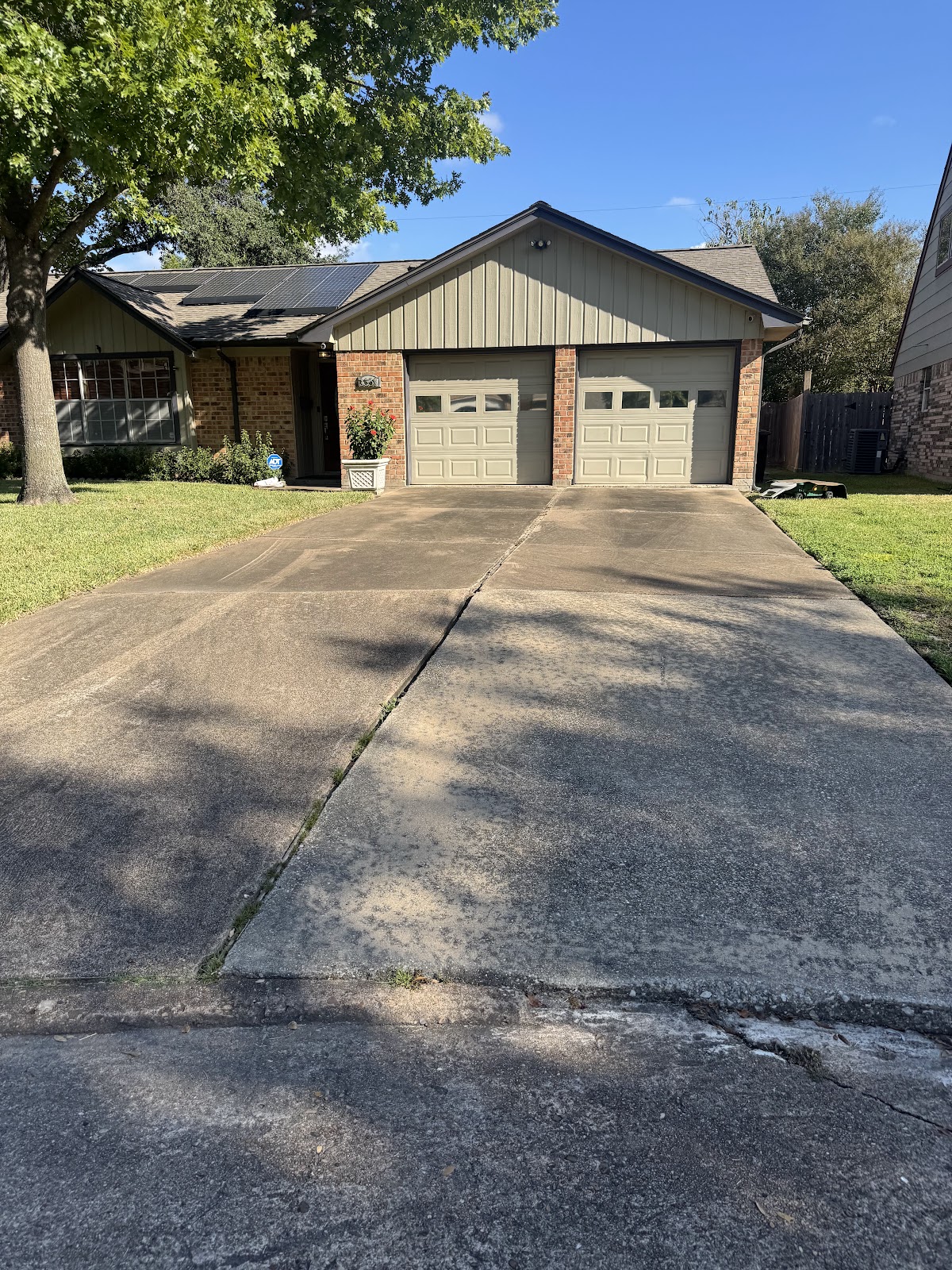 Driveway before pressure washing — Houston TX